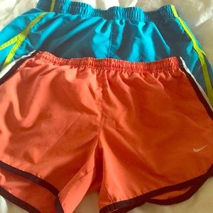 Pack of two workout shorts. 1-Nike 1-Underarmour